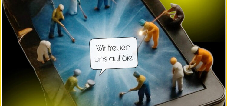 Fleißige Menschen machen ein Tablet wieder fit.